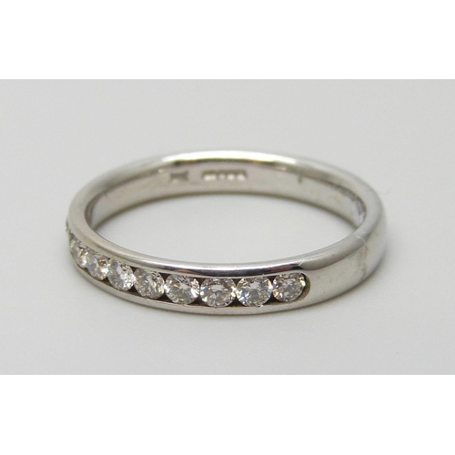 7103 - A 9ct white gold half eternity ring set with half a carat of diamonds, 2.4g, M