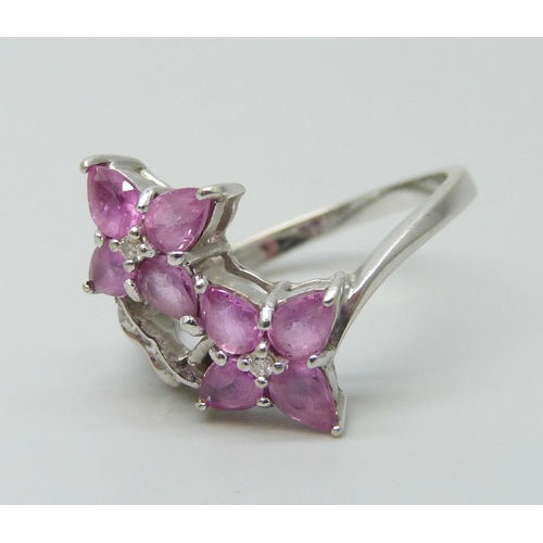 7104 - A 14ct white gold pink sapphire and diamond cocktail ring   
3.3g, N