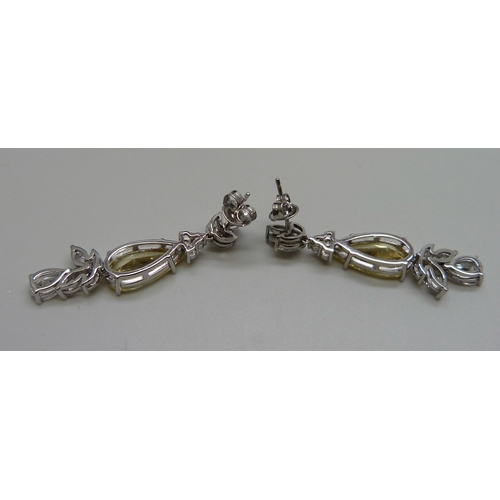 7111 - A pair of silver yellow Swarovski cubic Zirconia drop earrings by Cavendish French, 8.4g