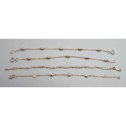 7116 - Four silver bracelets, 10.8g