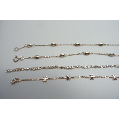 7116 - Four silver bracelets, 10.8g