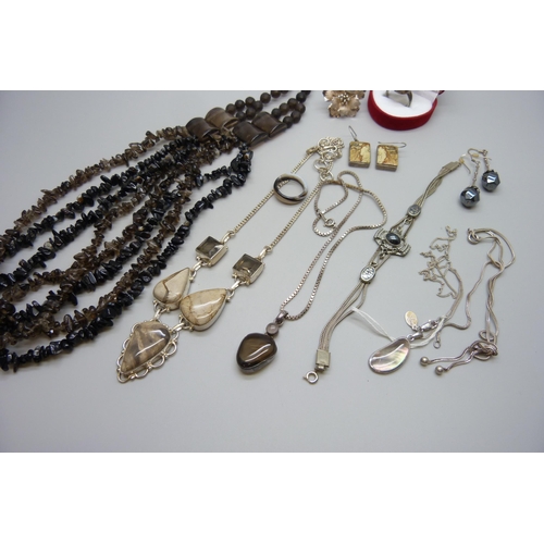 7119 - A collection of silver, white metal and stone set jewellery, bead necklace, etc.