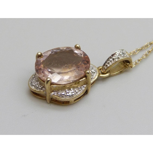 7121 - A 9ct yellow gold morganite and diamond pendant on a 9ct chain, 2.7g