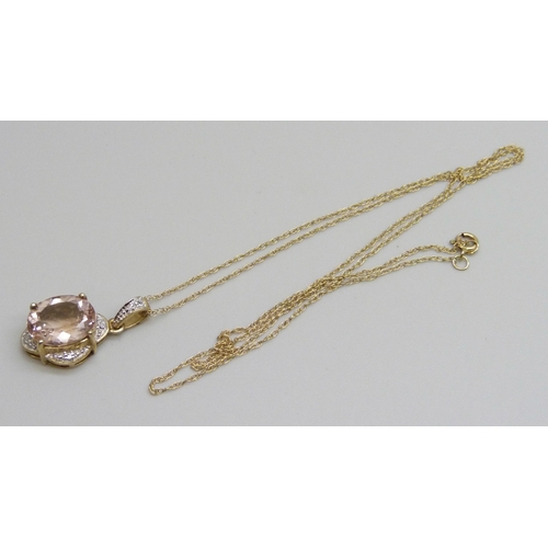 7121 - A 9ct yellow gold morganite and diamond pendant on a 9ct chain, 2.7g