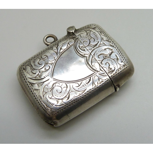 7127 - A silver vesta case with engraved decoration, Birmingham 1902