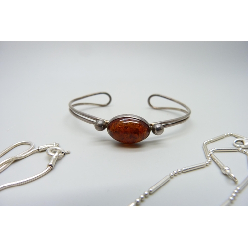 7133 - Two silver and amber necklets and a silver and amber bangle