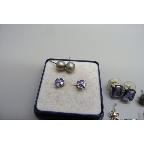 7155 - A pair of tanzanite earrings and three other pairs of gem set earrings