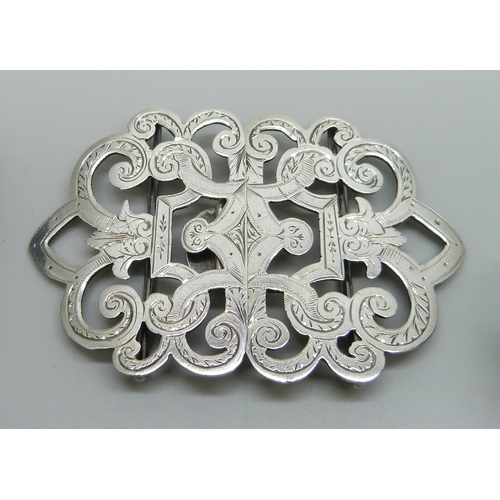 7156 - A silver engraved buckle, Birmingham 1899 and an Art Nouveau example