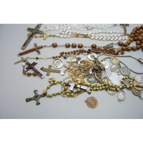 7216 - A collection of rosaries, cross pendants, etc.