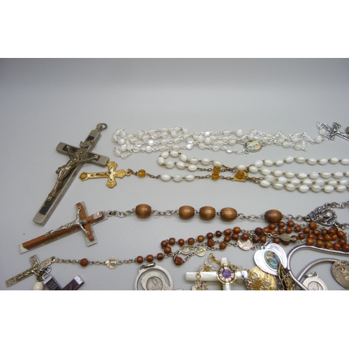 7216 - A collection of rosaries, cross pendants, etc.