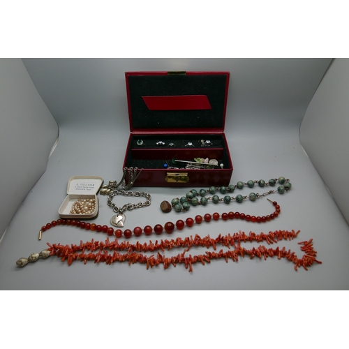 7233 - A red jewellery box with costume jewellery and Gemporia items, etc.