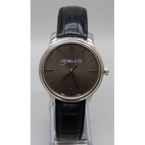 7268 - An H. Moser & Cie Monard platinum manual wind wristwatch with exhibition case back and power reserve... 