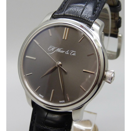 7268 - An H. Moser & Cie Monard platinum manual wind wristwatch with exhibition case back and power reserve... 