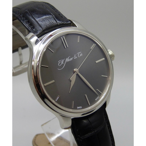 7268 - An H. Moser & Cie Monard platinum manual wind wristwatch with exhibition case back and power reserve... 