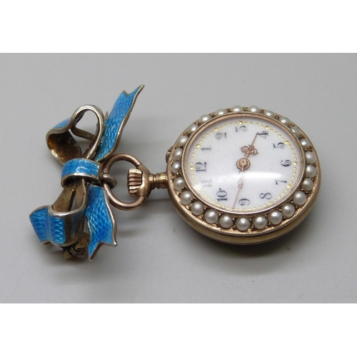 7278 - A silver gilt and split pearl pendant watch on enamelled bow clasp