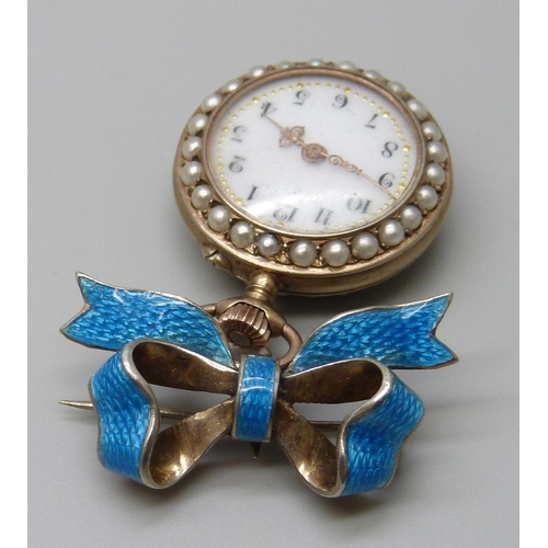 7278 - A silver gilt and split pearl pendant watch on enamelled bow clasp