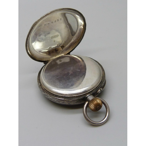 7279 - A silver open face fob watch in fitted case