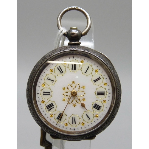 7283 - A silver open face fob watch and key