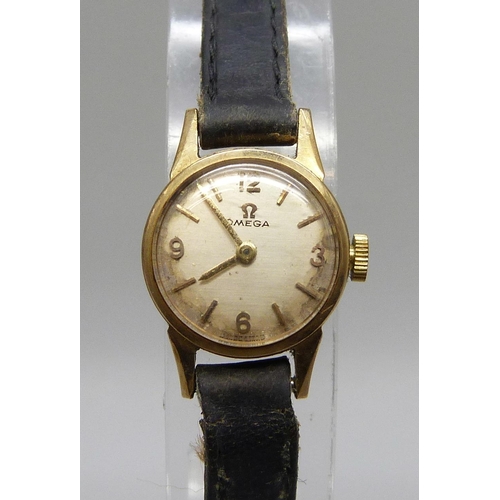 7292 - A lady's Omega 9ct yellow gold wristwatch with a 9ct gold Omega pin buckle