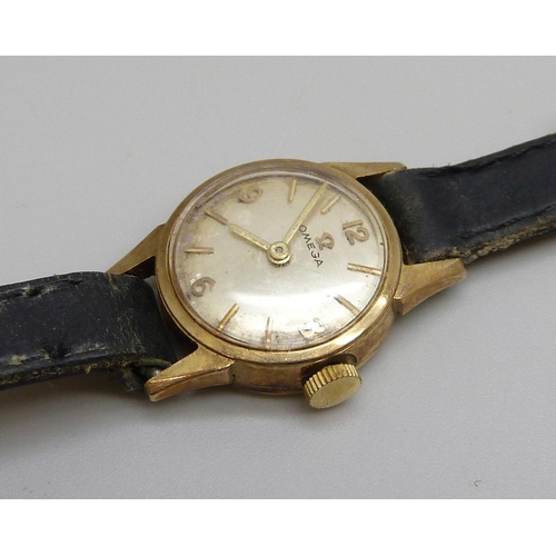 7292 - A lady's Omega 9ct yellow gold wristwatch with a 9ct gold Omega pin buckle