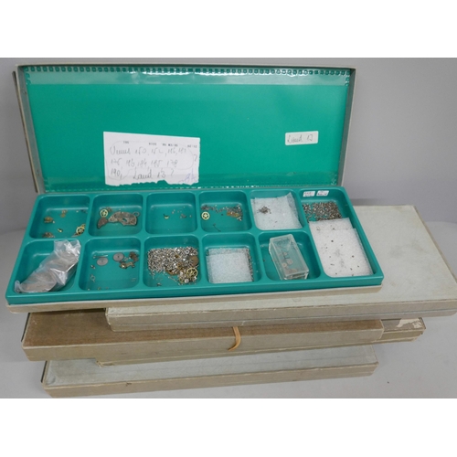 7312 - Five vintage Certina watch boxes containing various Landeron & Venus chronograph watch parts