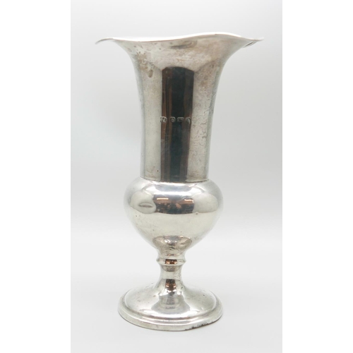 7320 - A silver vase, weighted, 15.5cm