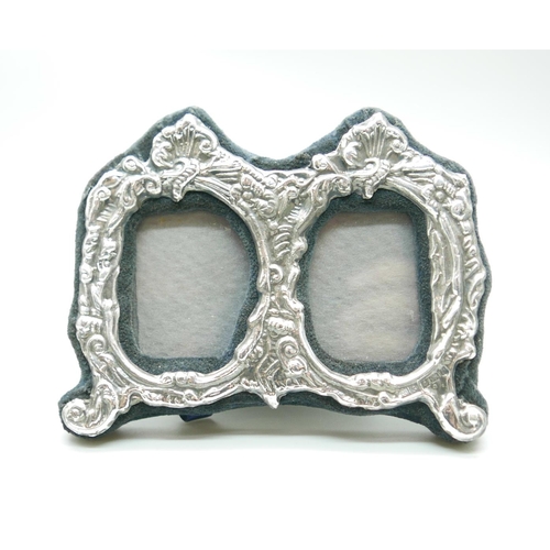 7326 - A silver double photograph frame, Birmingham 1995, 10cm wide