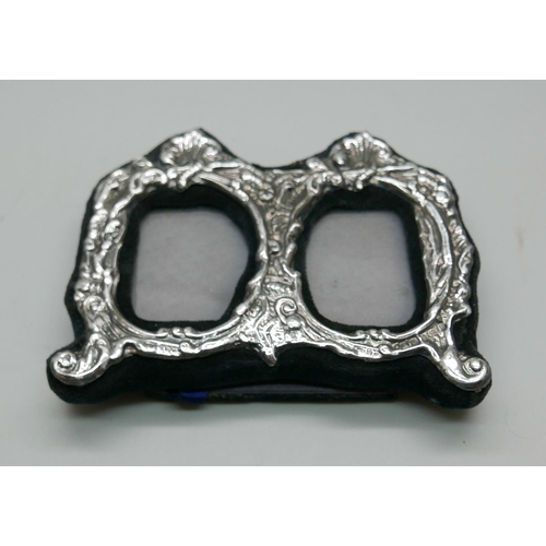 7326 - A silver double photograph frame, Birmingham 1995, 10cm wide