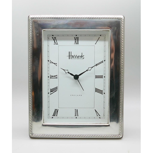 7330 - A Harrods silver framed clock, 12.5cm x 16.5cm