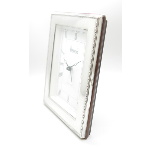 7330 - A Harrods silver framed clock, 12.5cm x 16.5cm