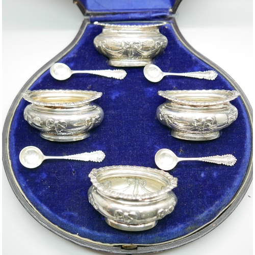 7331 - A cased set of four late Victorian silver salts with spoons by Walker & Hall, 193g