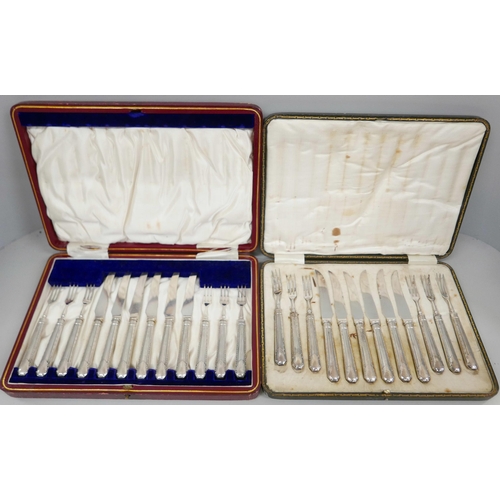 7339 - Two cased sets of pastry knives and forks with silver handles, one knife a/f