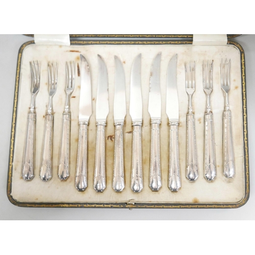 7339 - Two cased sets of pastry knives and forks with silver handles, one knife a/f