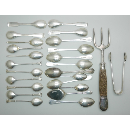 7344 - A collection of silver spoons, 239g, a silver mounted toasting fork and ten plated spoons