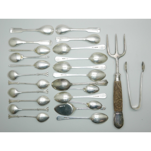 7344 - A collection of silver spoons, 239g, a silver mounted toasting fork and ten plated spoons