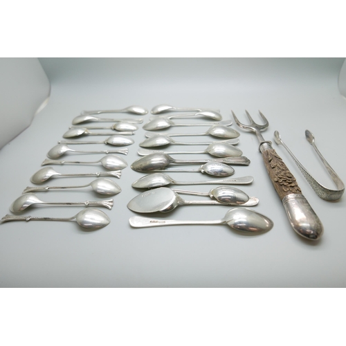 7344 - A collection of silver spoons, 239g, a silver mounted toasting fork and ten plated spoons