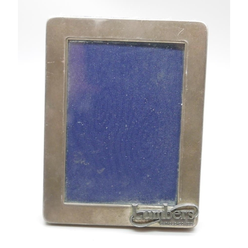 7346 - A silver photograph frame, 'Lumbers', 8cm wide