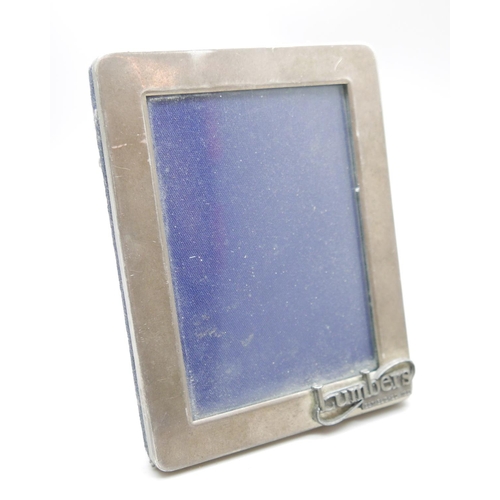 7346 - A silver photograph frame, 'Lumbers', 8cm wide