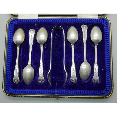 7349 - A cased set of silver spoons and sugar bows, 125g