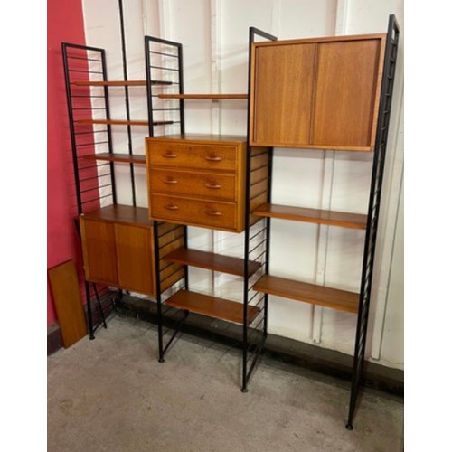 1 - A Staples teak and black metal Ladderax room divider