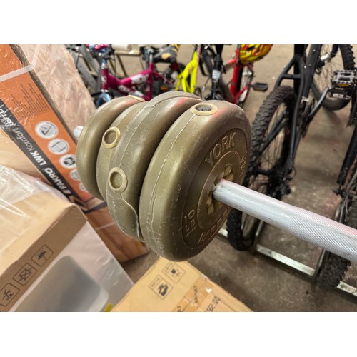 5198 - A weight lifting bench and a quantity of York plastic coated barbell weights including four 4.5kg we... 