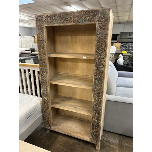 3108 - A wooden bookcase with an antique white lime finish