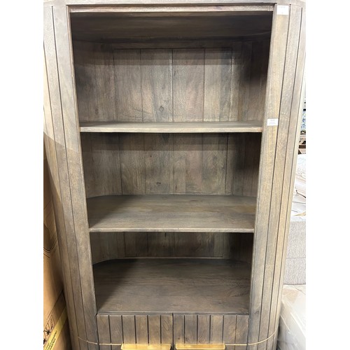 3119 - A mango wood and marble bookcase * This lot is subject to Vat