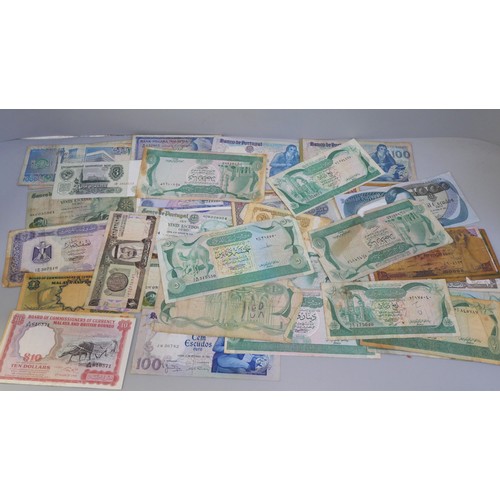 2211 - A collection of 50 worldwide bank notes, 1980s onwards