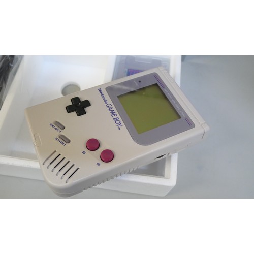 2188 - A European Nintendo Game Boy DMG-01 handheld games console and Tetris game bundle with plastic games... 