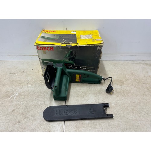 5303 - A Bosch PKE 30 B 240v electric chainsaw and a box of cobblers tools including shoe stretchers and an... 