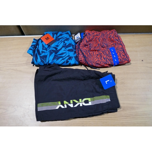 6040 - DKNY mens swimming shorts x 18 in blue, red and black. Various sizes with tags (340-73888) *This lot... 