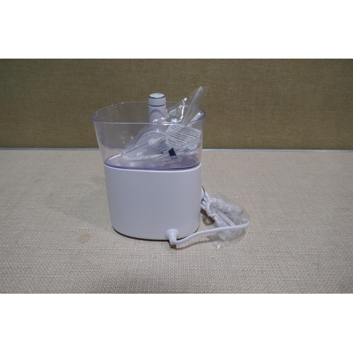 6217 - Waterpik Water Flosser with box and accessories  (340-279) *This lot is subject to Vat