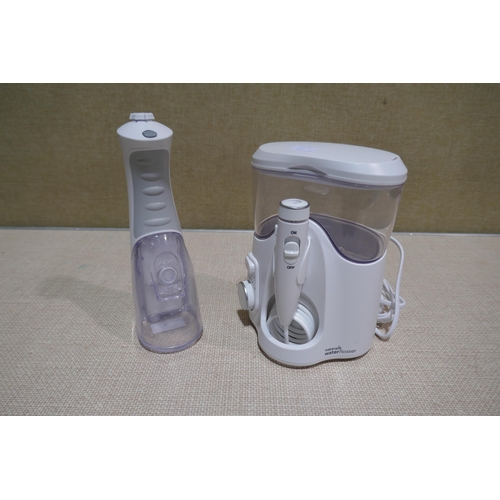 6218 - Waterpik Water Flosser with box and accessories  (340-156) *This lot is subject to Vat