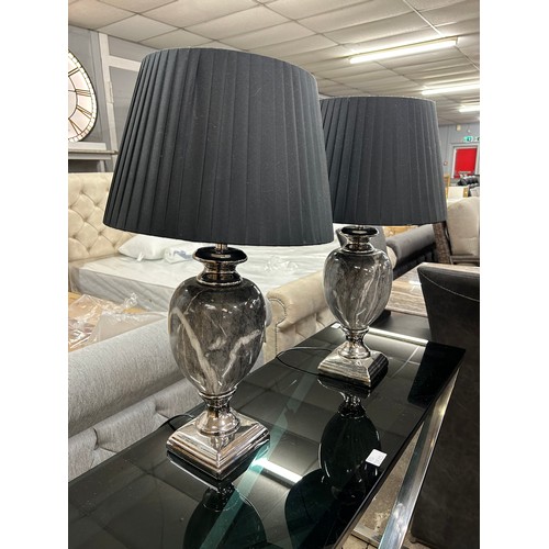 3183 - A pair of black marble effect urn table lamps with black shades